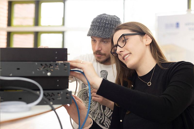 student working with servers